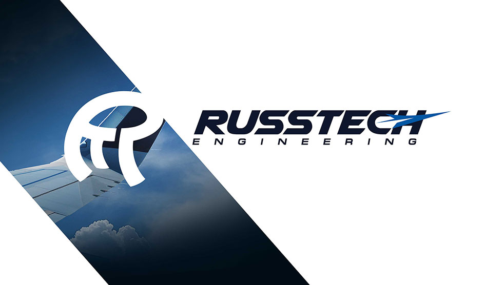 Russtech Logo-Airplane wing in sky-Mobile Hero Image